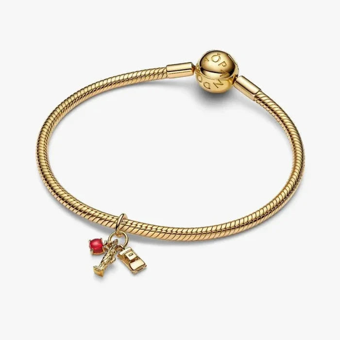 PANDORA New York Icons Triple Dangle Charm in 14k gold plating with Murano glass apple, Statue of Liberty and yellow taxi cab