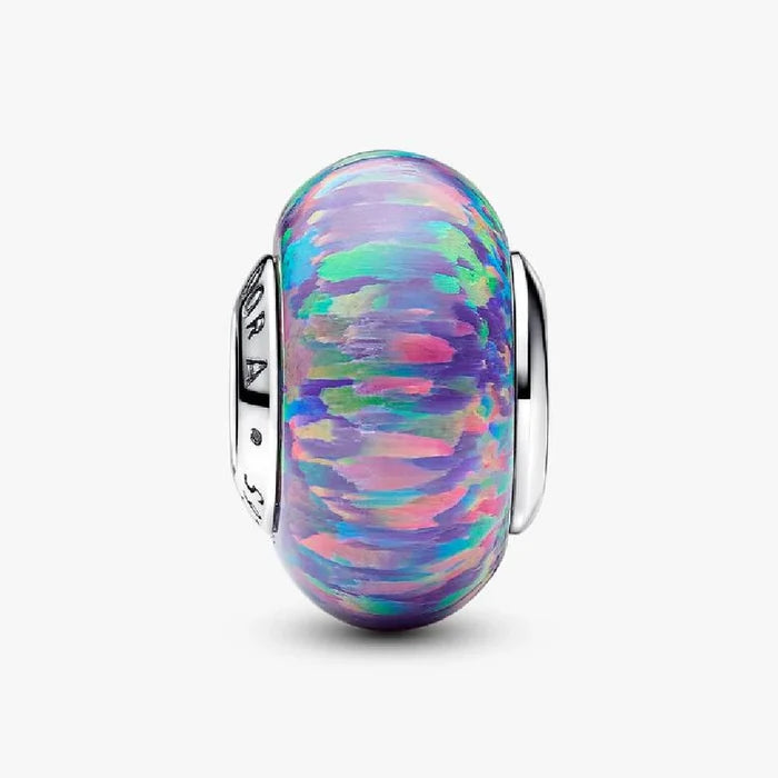 This Pandora Opalescent Purple Charm adds an enchanting pop of color to your jewelry collection.