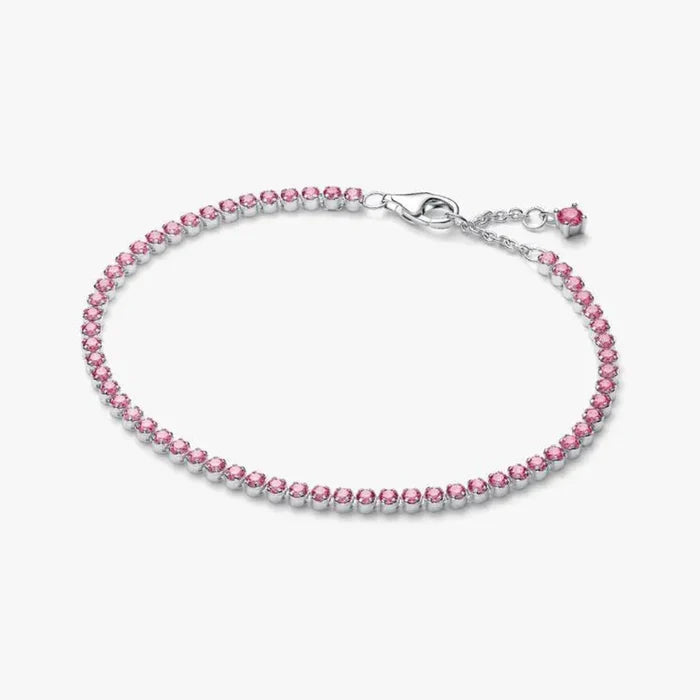 Pandora Pink Small Tennis Bracelet in sterling silver featuring a continuous row of pink cubic zirconia stones, displayed on a white background.