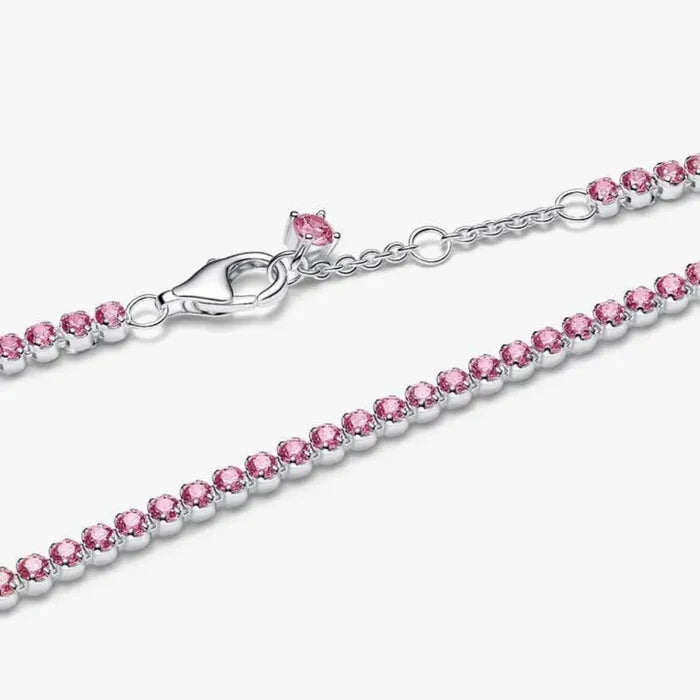 Pandora Pink Small Tennis Bracelet in sterling silver with pink cubic zirconia displayed on a white background.