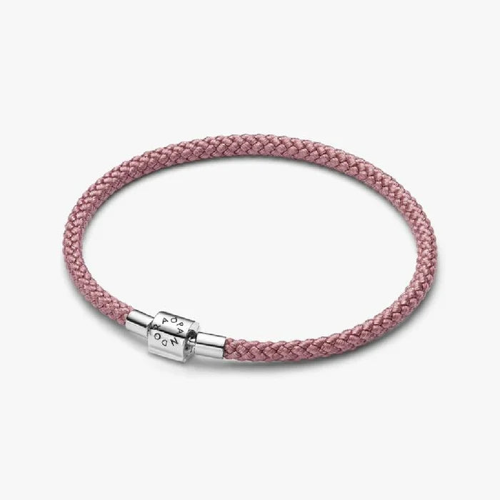 A pink braided leather bracelet featuring a sleek silver clasp.