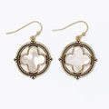 Antiqued gold clover earrings featuring luminous mother of pearl accents