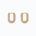 Periwinkle chic ribbed gold huggie earrings with a textured finish and compact hoop design