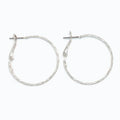 Periwinkle delicately textured silver hoop earrings with a classic silhouette and refined finish