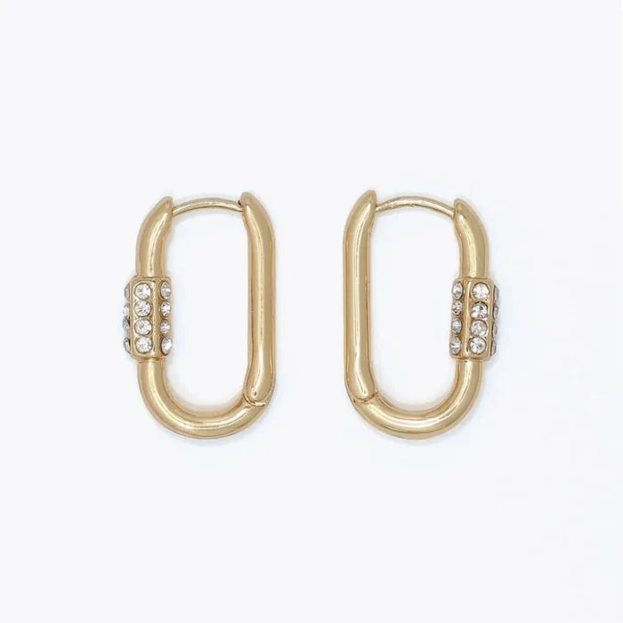 Gold carabiner huggie earrings featuring sparkling crystal accents and a modern design