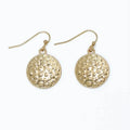 Hammered gold circle earrings featuring a textured finish and classic round design