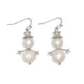 Periwinkle pearl snowmen earrings featuring elegant silver hats and festive snowman details, perfect for winter and holiday outfits.