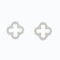 These Periwinkle Silver Beaded Clover Earrings features a graceful clover-inspired shape with intricate silver beaded detailing.