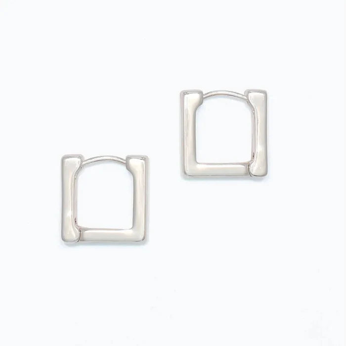 Periwinkle silver square huggie earrings with a sleek geometric design and polished finish
