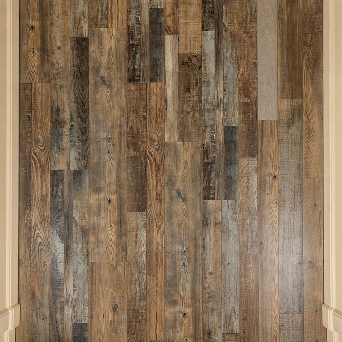 Elevated view of Reclaimed Oak Country laminate flooring in a hallway setting.