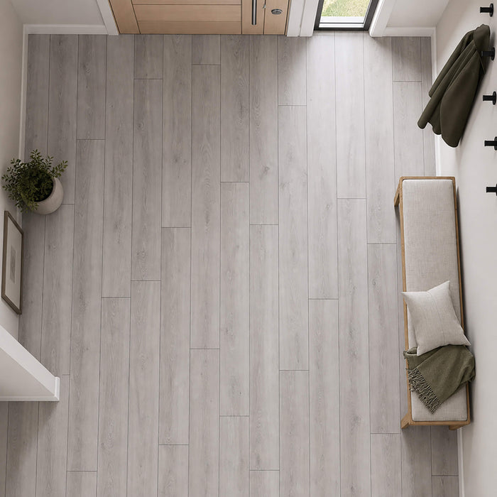 Elevated view of Rockford Oak laminate flooring in a modern hallway setting.