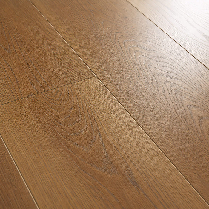 Close-up of visible grain patterns and subtle light reflections of Sable Oak Prestige Plus laminate flooring.