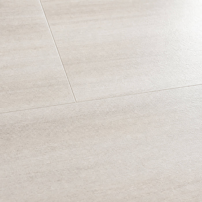 Close-up of the Sandstone Rigid LVT floor tiles.