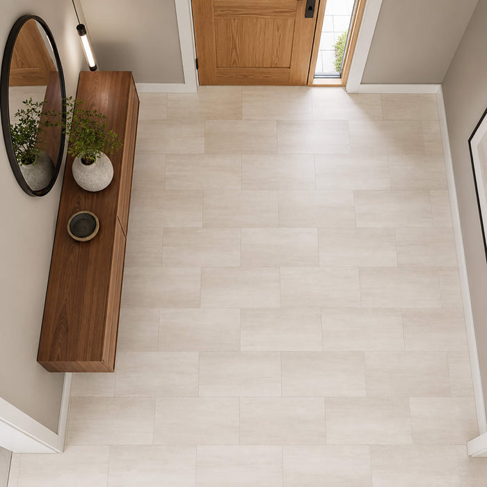 Elevated view of Close-up of Sandstone Rigid LVT floor tiles in a modern hallway setting.
