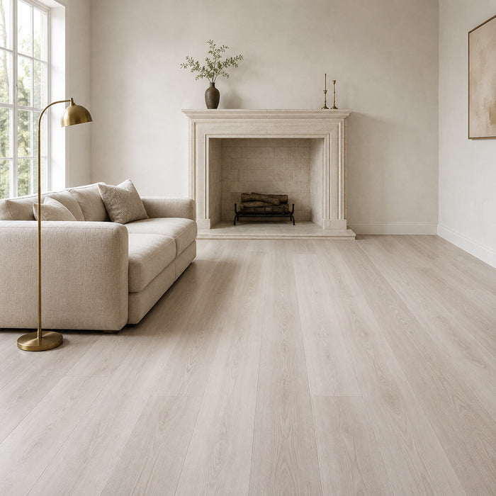 Modern living room with Siberian Oak Rigid LVT flooring with a beige sofa, gold floor lamp, and fireplace.