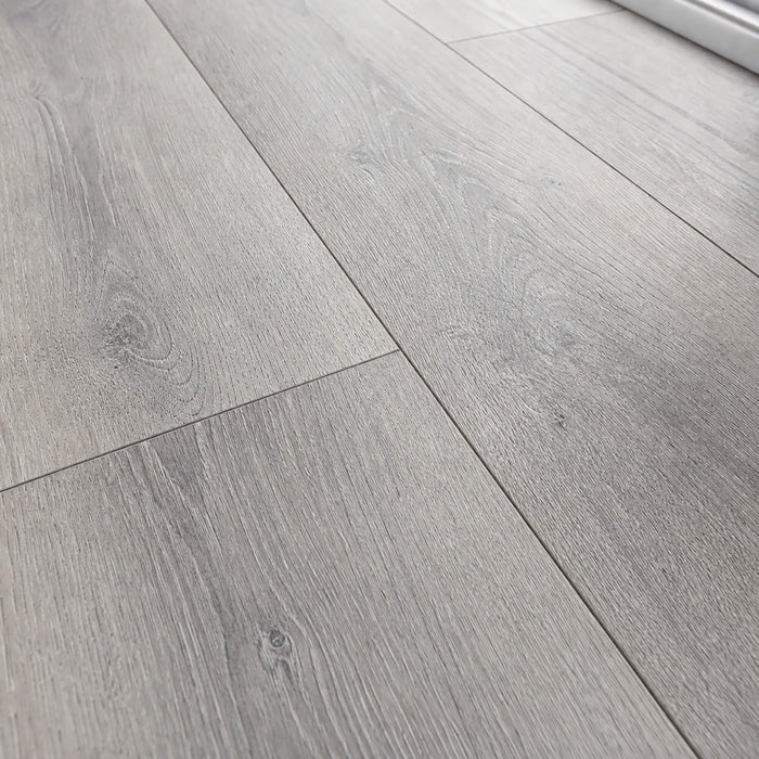 Close-up of the grain and texture of Silver Grey Oak Prestige laminate flooring.