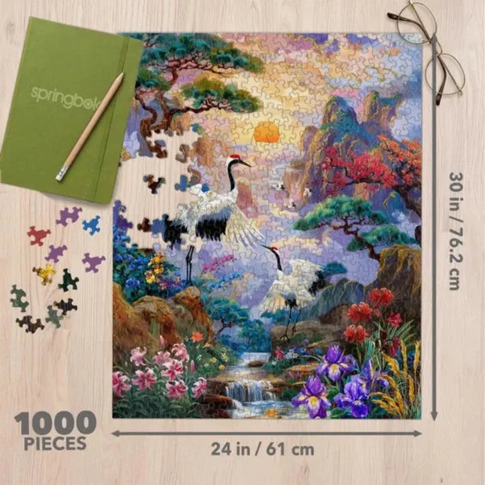 This Springbok Crane Creek 1000 Piece Jigsaw Puzzels captures a serene waterway scene with rich natural colors and stunning detail.