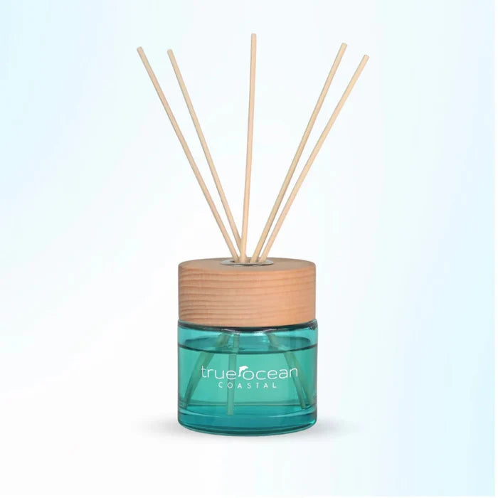 Infused with our signature essential oil-based fragrance, Coastal, this diffuser fills your space with the fresh, sunlit aroma of bergamot, palm leaf, and mandarin — a carefree blend of sand, surf, and ocean breeze.