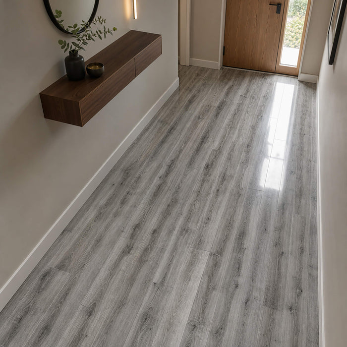 Uptown Oak Gloss laminate flooring in an interior home hallway setting.