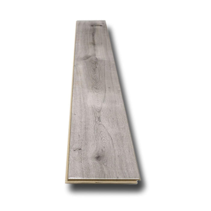 Uptown Oak Gloss laminate flooring plank on a white background.