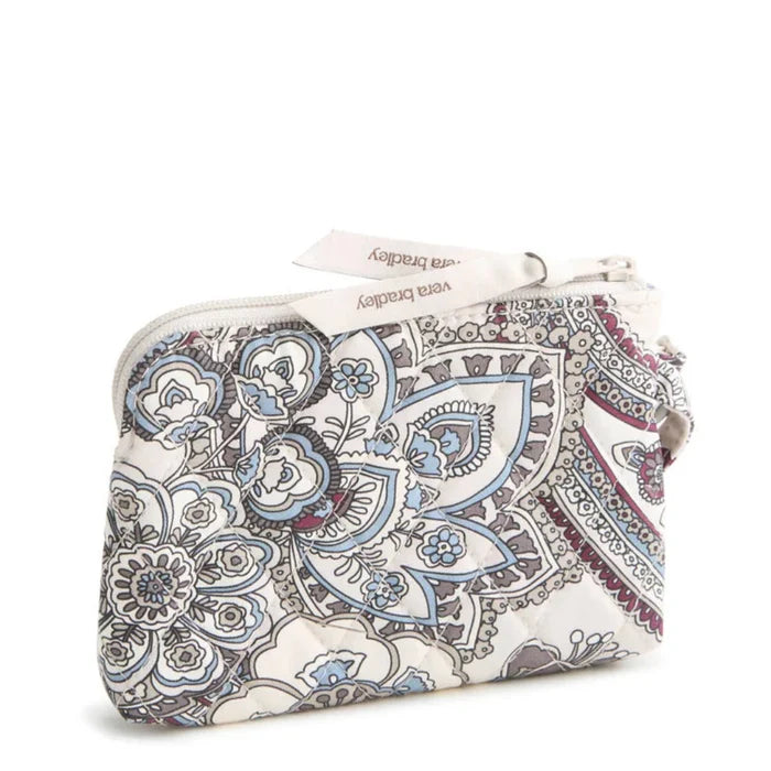 Vera Bradley Clip & Zip Wristlet in Neutral Rhapsody pattern with compact zippered design and convenient clip.