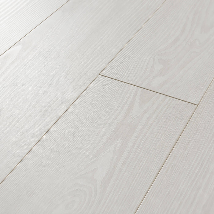 Close-up of Virgin Scandi laminate flooring with a subtle texture.