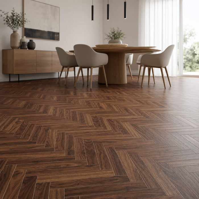 Walnut Herringbone laminate flooring in a home dining room setting.