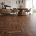 Walnut Herringbone laminate flooring in a home dining room setting.