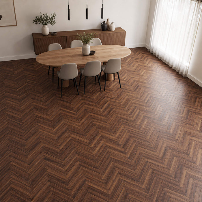 Walnut Herringbone laminate flooring in a modern dining room setting.