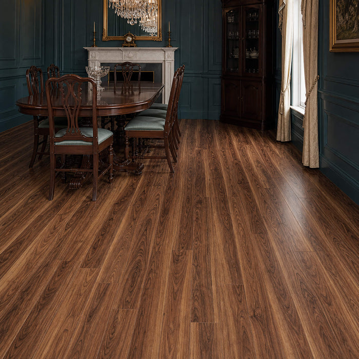Walnut prestige laminate flooring in a dining room setting.
