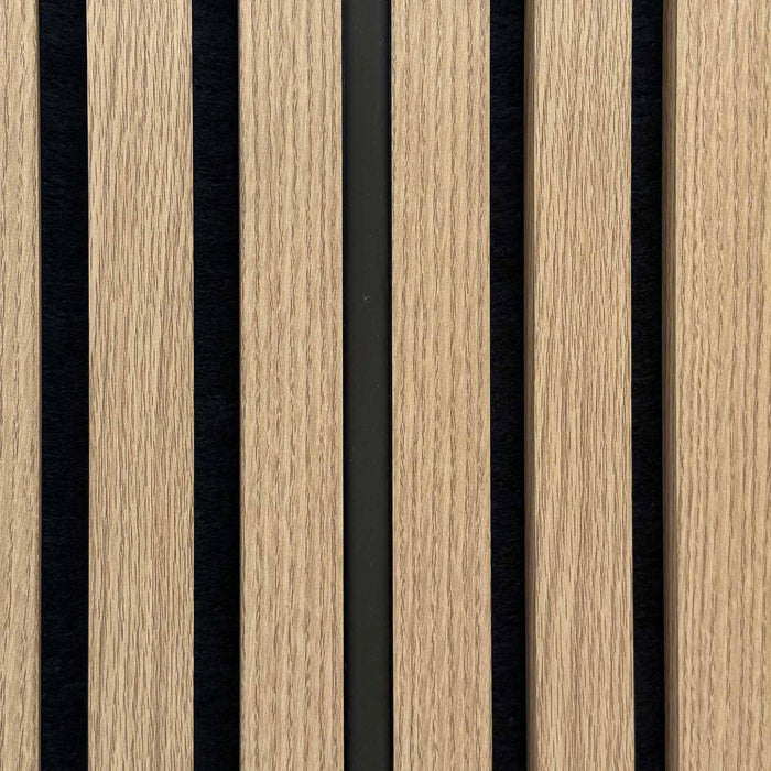 Close up of an unlit Warm White silicone LED light tube in acoustic slatwall