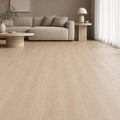 Beige living room with a sectional sofa and Washed Oak Essentials laminate flooring.