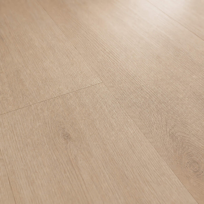 Close-up of the grain and texture of Washed Oak Essentials laminate flooring.