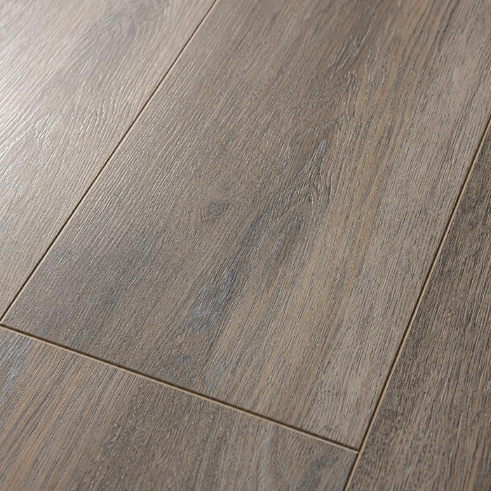 Close-up of the grain and texture of Weathered Oak Prestige laminate flooring.