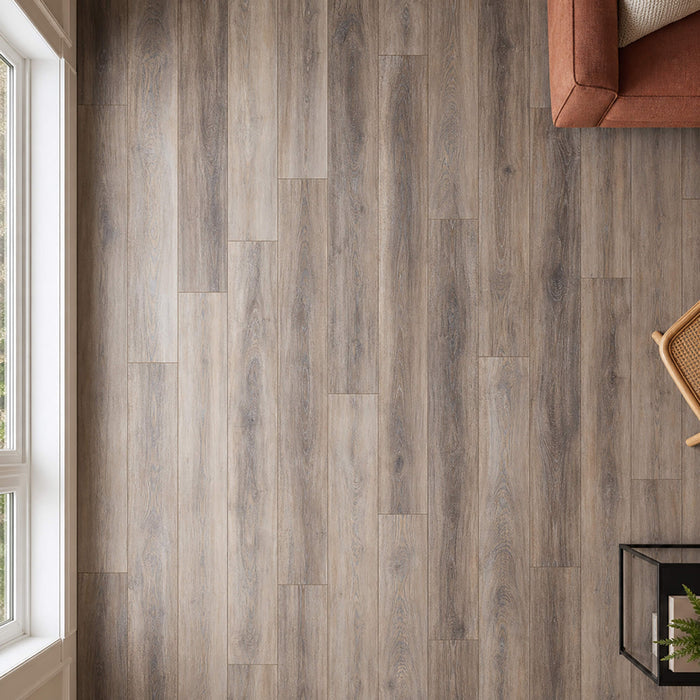 Elevated view of Weathered Oak Prestige laminate flooring in a living room setting.