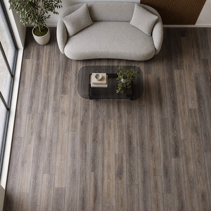 Elevated view of Close-up of Weathered Oak Rigid LVT flooring in a living room setting.
