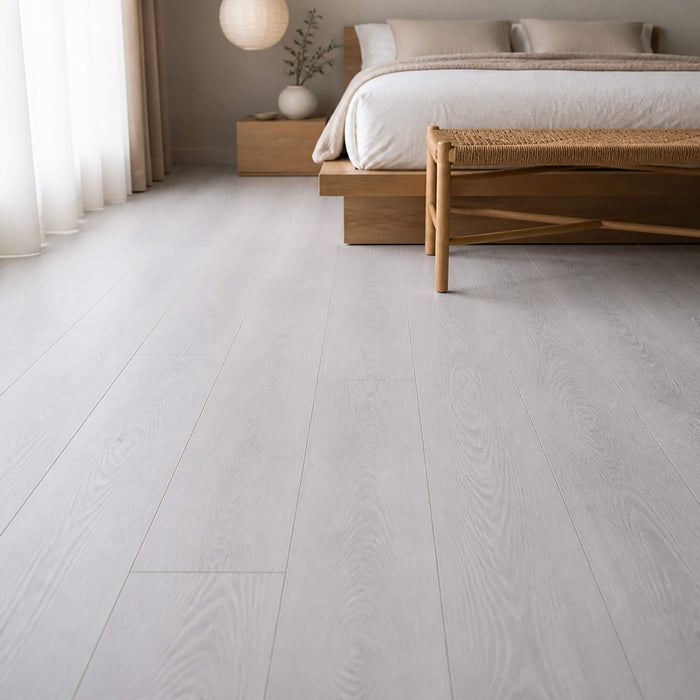 Yosemite Oak Country laminate flooring in a modern bedroom setting.